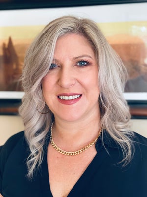 Portrait of Corinna Thompson, Realtor